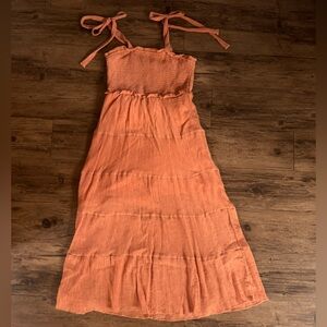New In Boutique Halter Ruffle Dress. Size M. Rust, comfy, lined.